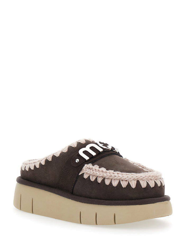 Bounce Brown Mules with Logo Lettering and Open Rear in Leather Woman Sheep Flat Shoes