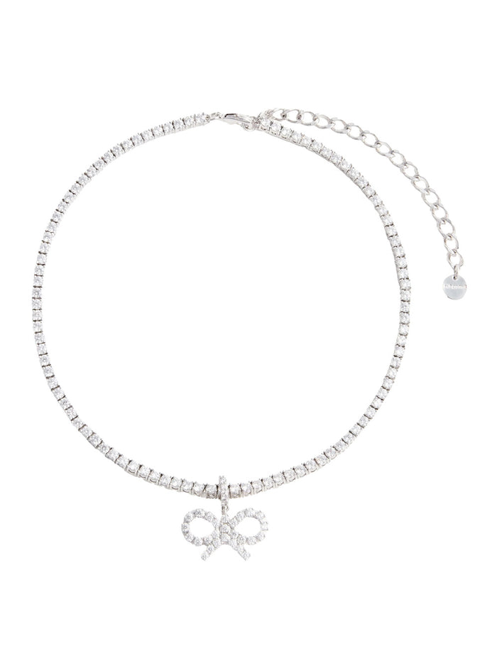 Metallic Tennis Necklace With Bow Charm And Crystal Embellishments Brass Woman Necklaces