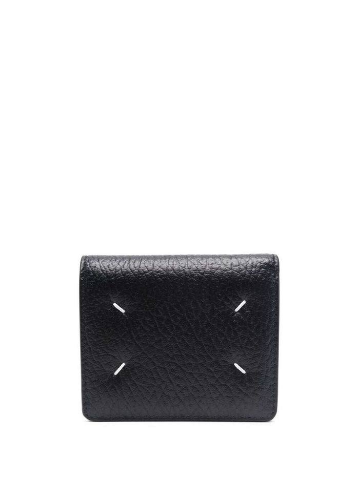 Bi-Fold Wallet With Four Stitching Points And Logo Lettering Embossed Inside Grained Black Leather Woman Calf Products