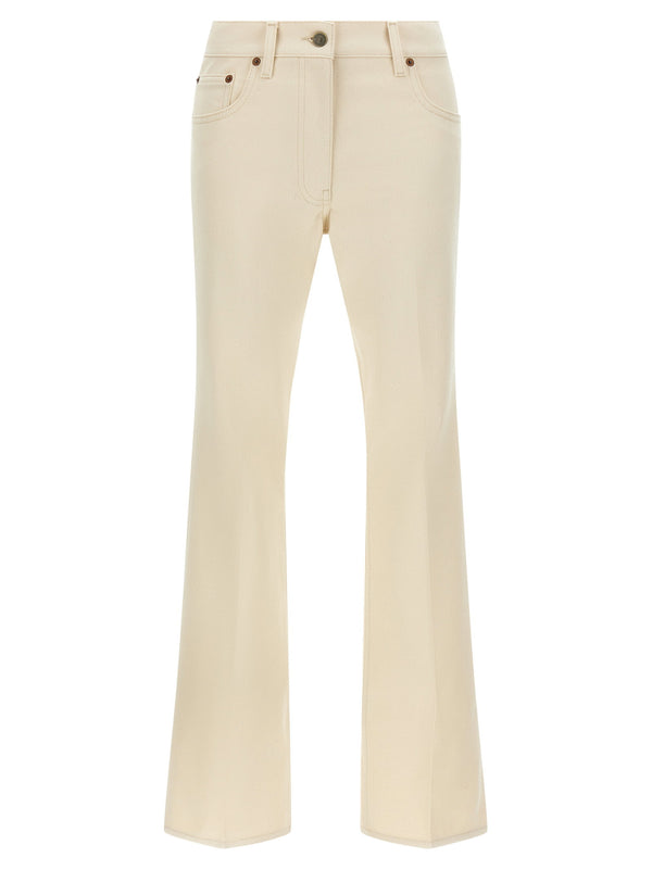 Valentino Garavani Garment-Dyed Flared Denim Jeans — Cream