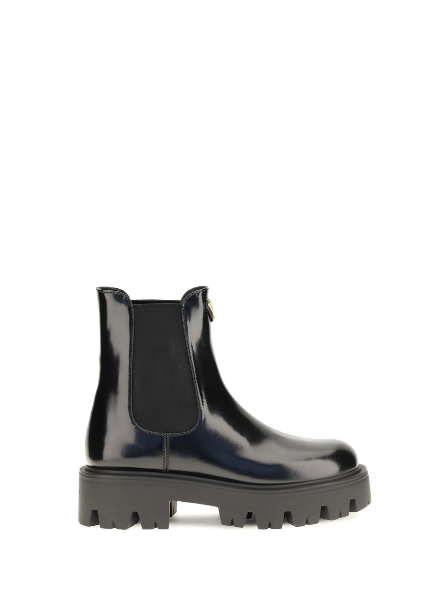 Prada 100% calf leather upper; 100% rubber sole boots in black