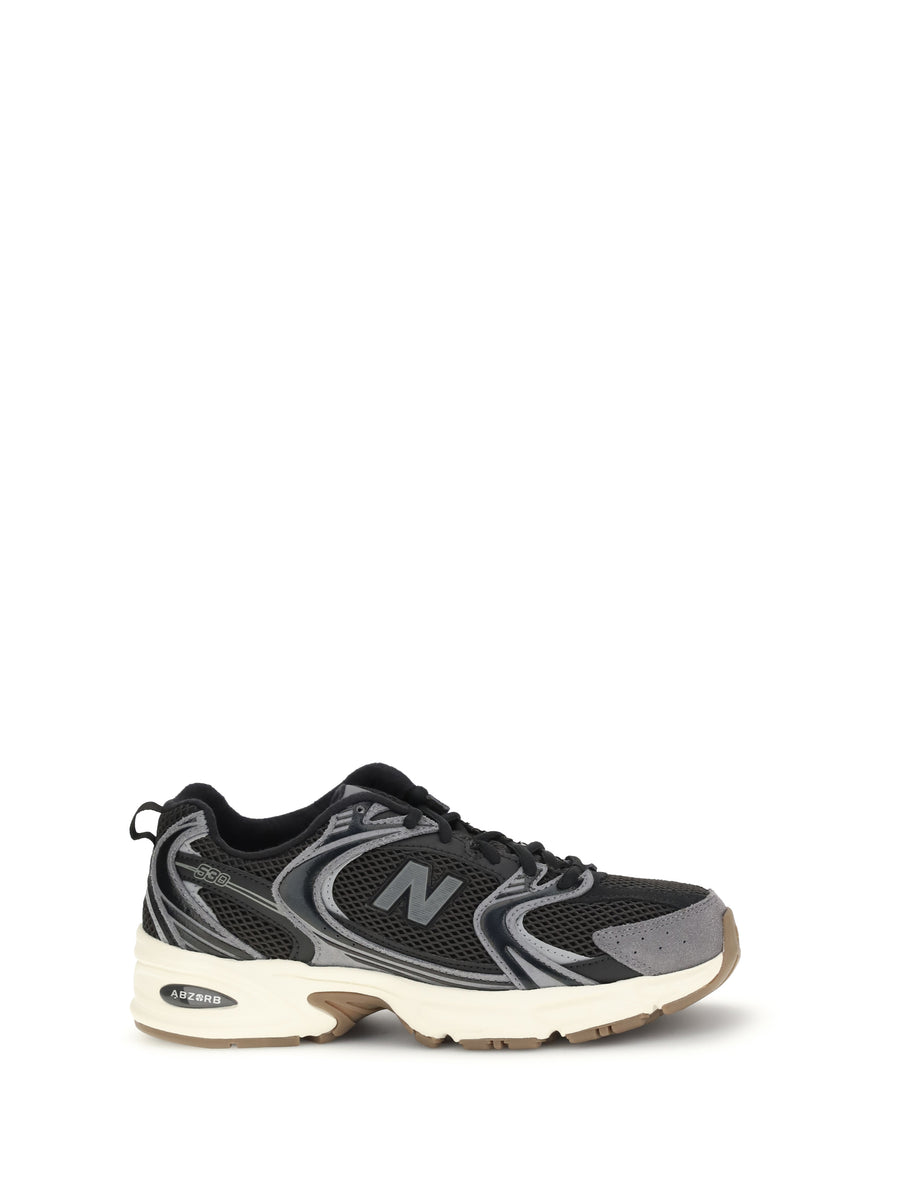 New Balance UPPER: 50% Calf Leather; UPPER: 50% Polyester; SOLE: 100% Rubber sneaker in gray