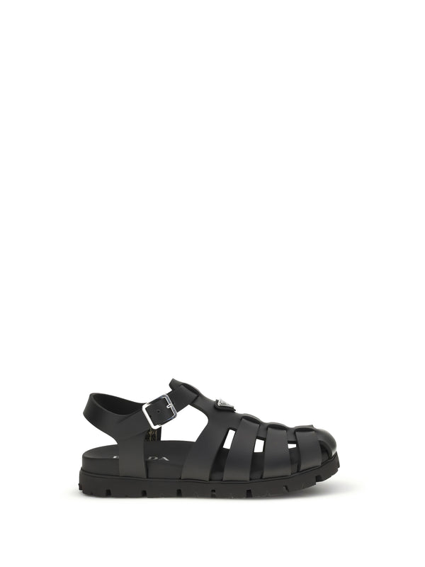 Prada Upper: 100% calf leather; Sole: 100% rubber sandal in black