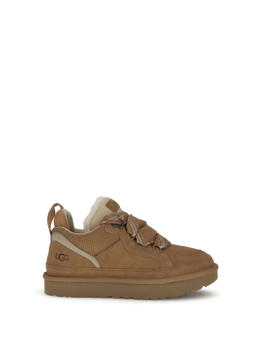 UGG Upper: 100% Chamois Leather; Sole: 100% Rubber boot in brown