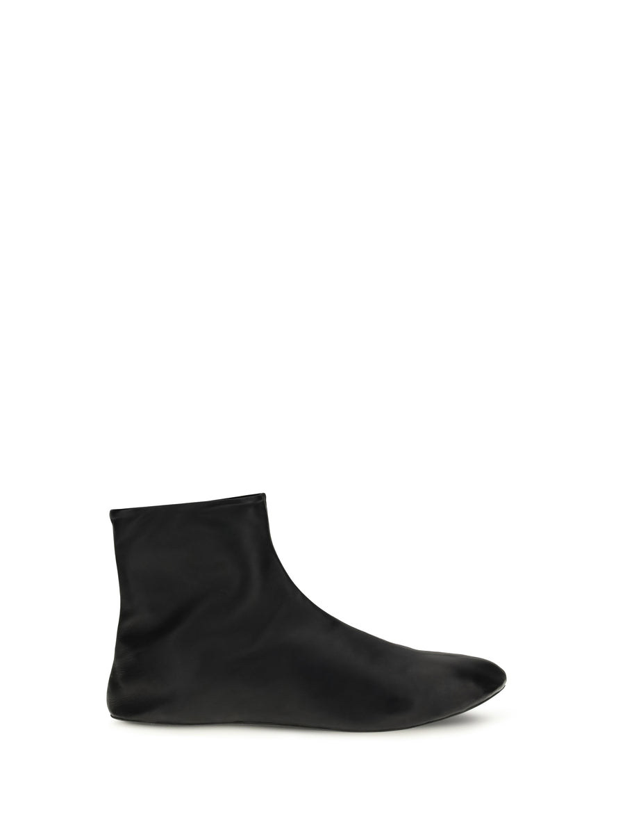 The Row Upper: 100% lamb leather; Sole: 100% rubber ankle boot in black