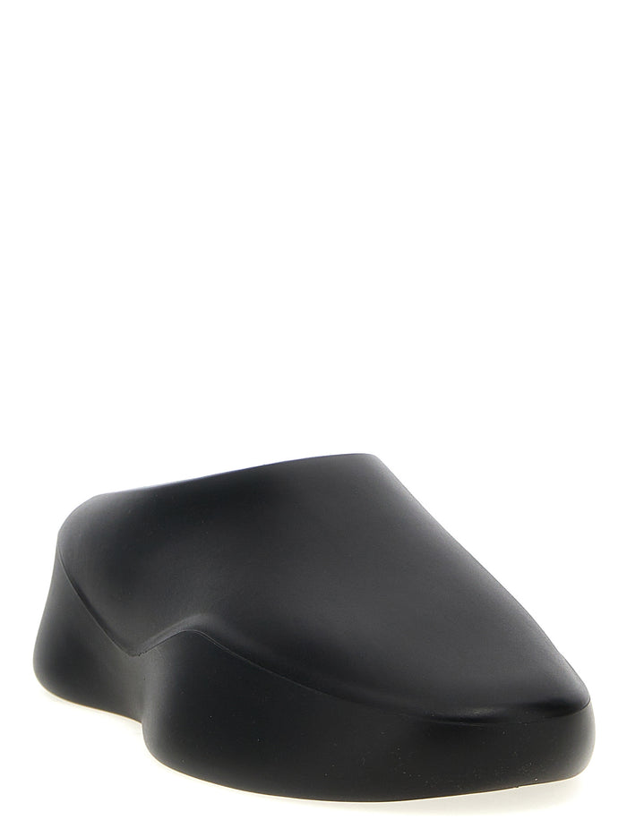 Eva Runner sabots Black Rubber Flat Shoes