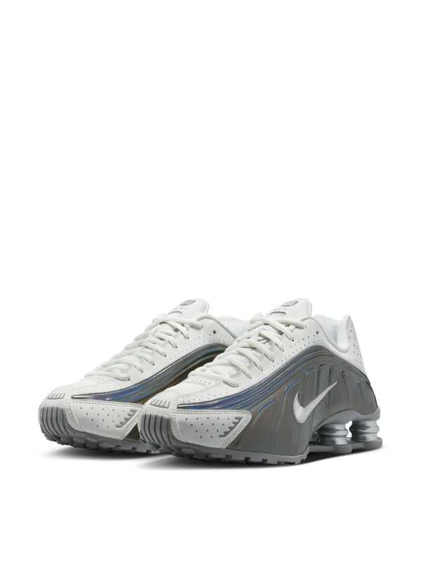 Nike Perforated leather sneakers in white