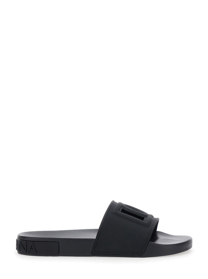 Black Sandals With Tonal Logo Lettering On The Rear And Open Toe Rubber Man Flat Shoes