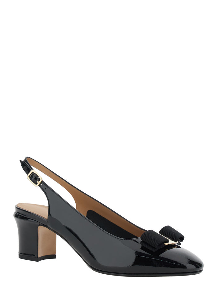 Vetty Black Pumps with Logo Plate on the Front and Low Block Heel in Leather Woman Calf Heels