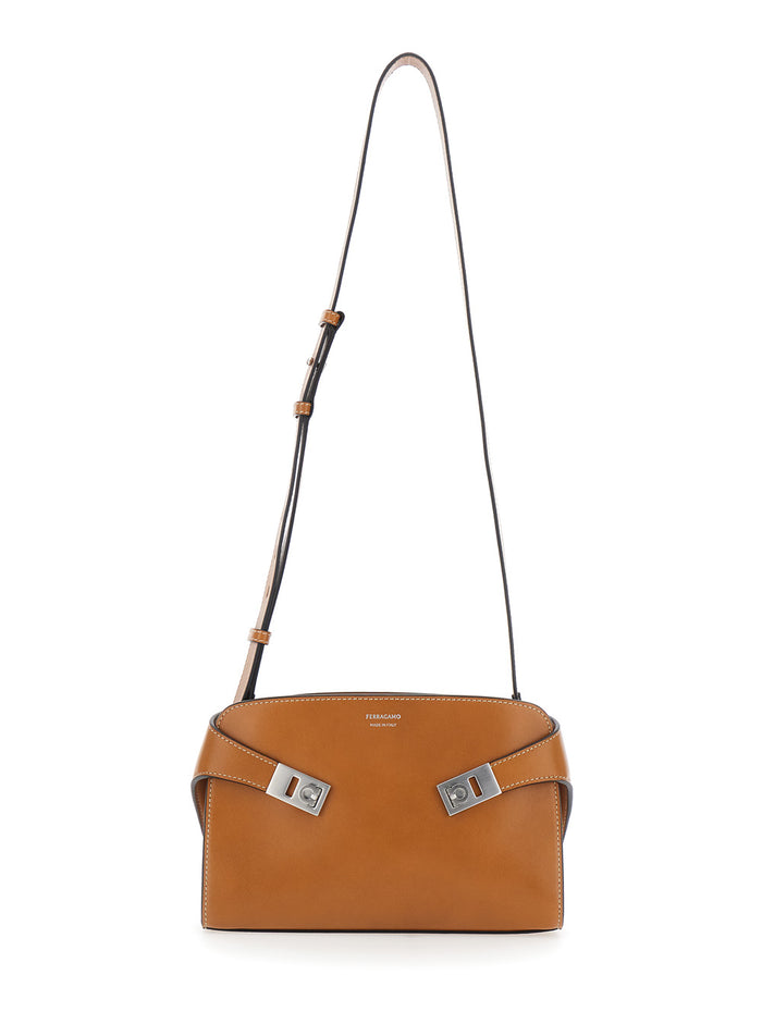 Messenger Hug Brown Crossbody bag with Lettering Logo and Gancini Buckles in Leather Man Lamb