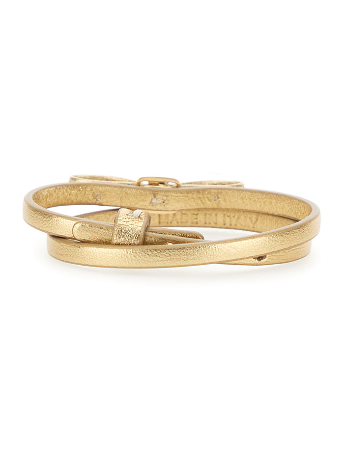 Bracelet with Logo Plate and Bow Decoration in Gold-Colored Brass for Women Metallic Calf Leather