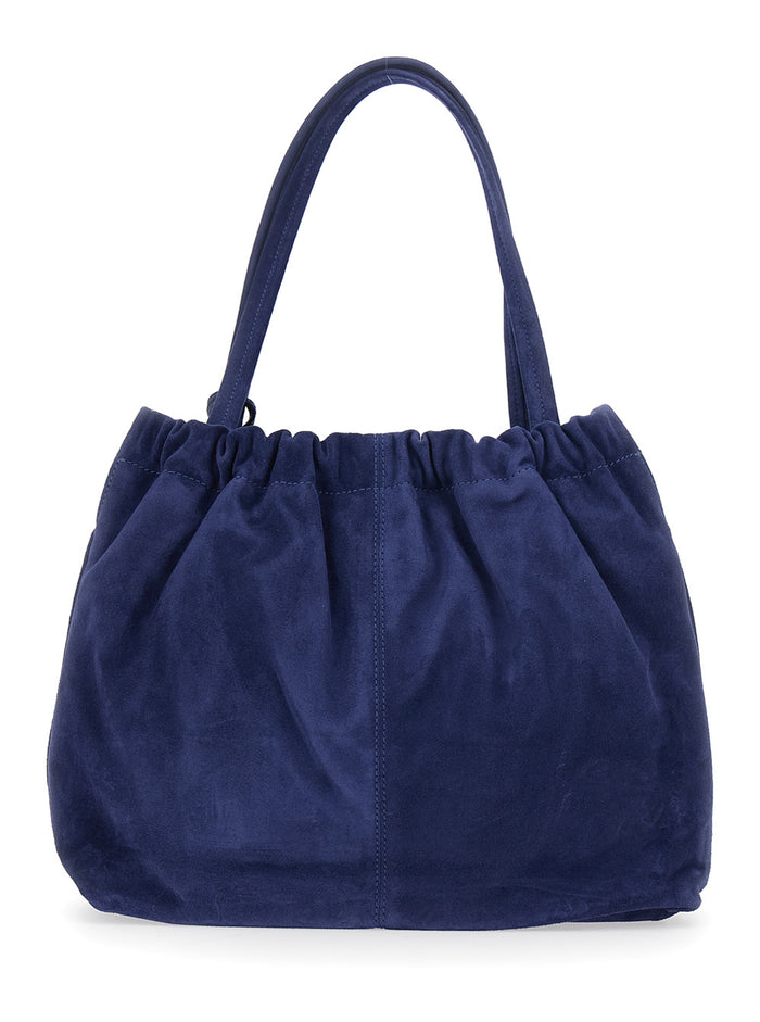 Shoulder Bag The Tote with Chain Detail and Suede Drawstring Closure in Blue for Women Blu Cow Leather