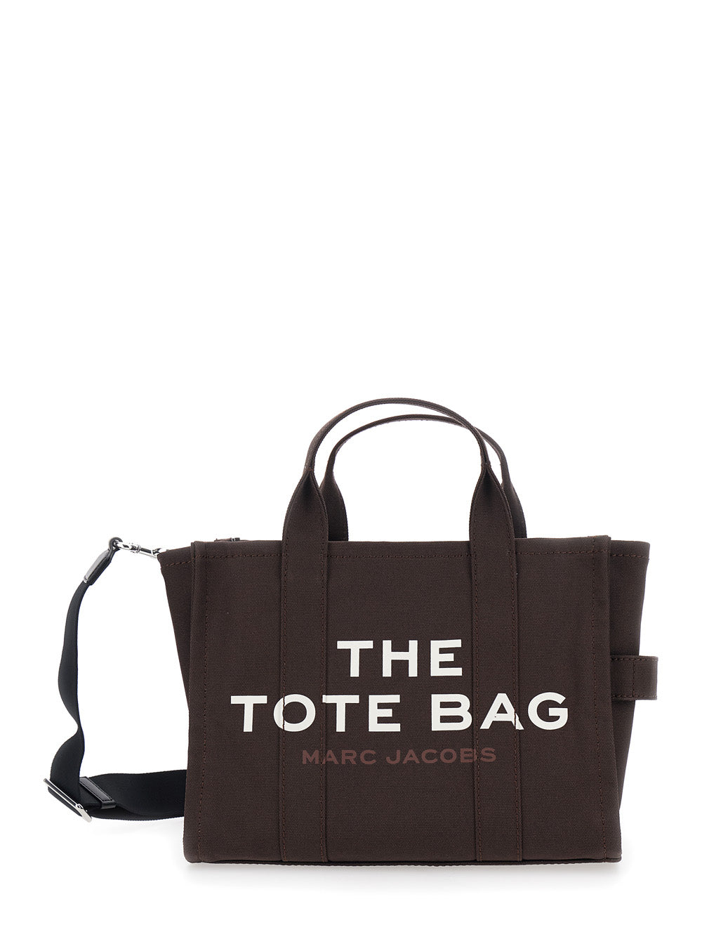 The Medium Tote Brown Bag with Contrasting Logo Lettering on Front in Cotton Woman Hand