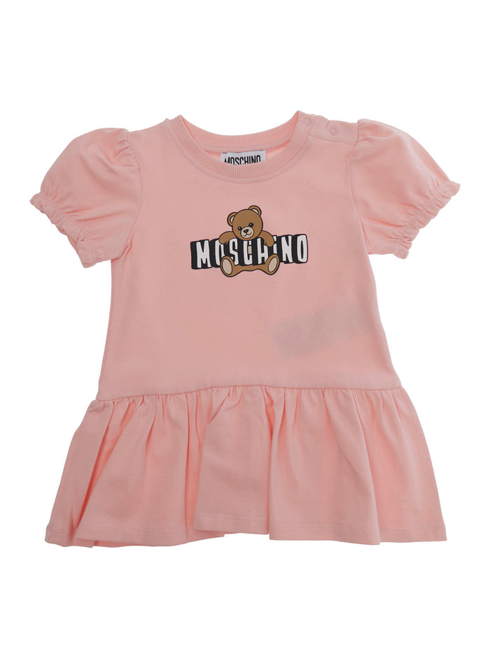 Moschino Crew Neck Dress with Elasticated Hems and Logo Print on Front in Baby Pink Cotton Elastane