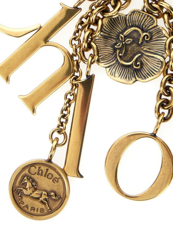 Gold Keychain with Chain Details and Letter Charms in Brass Blend for Women Metallic Zamak Leather Products