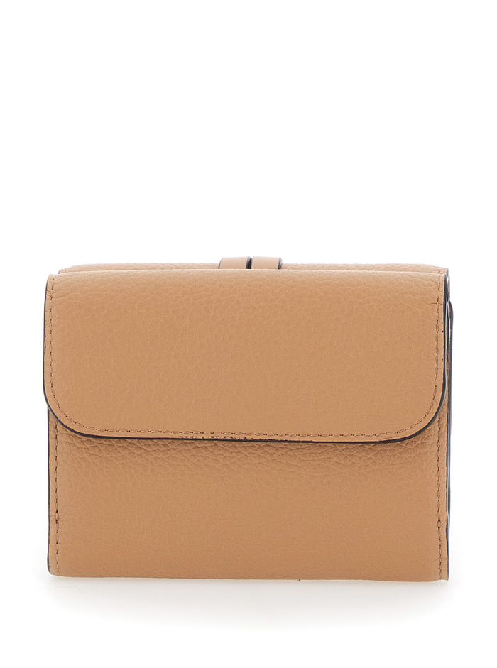 Small Tri-Fold Wallet with Charm on the Front and Magnetic Closure in Beige Leather for Women Products