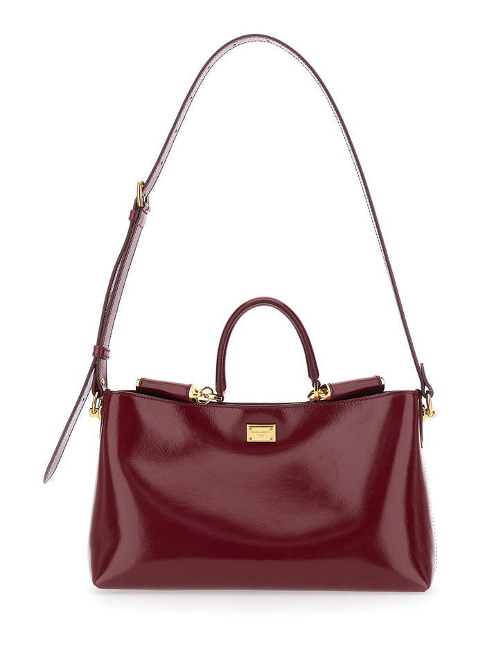 Handbag Vittoria with Adjustable Shoulder Strap and Logo Plate on Front in Bordeaux Leather for Women Calf Hand Bags