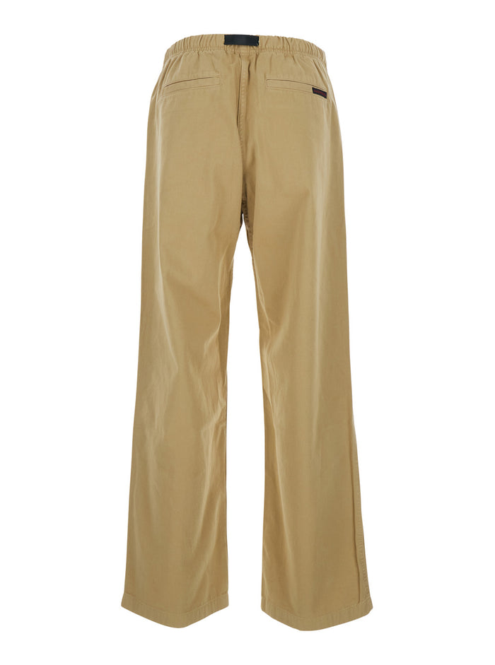 Beige pants with elasticated waist and contrasting bel Trousers