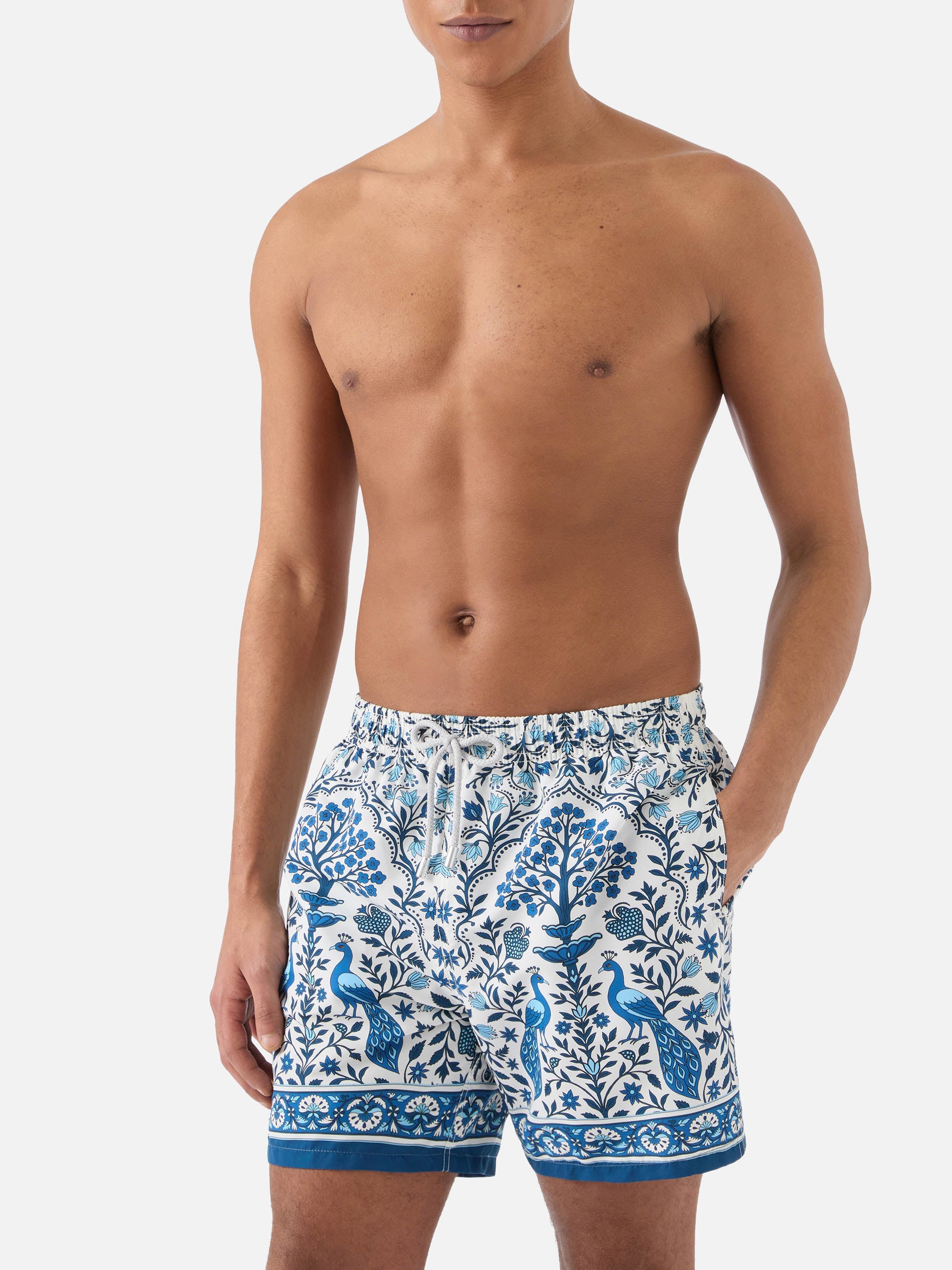 Gustavia White Swim Shorts With Contrasting Peacock Print Swimshort