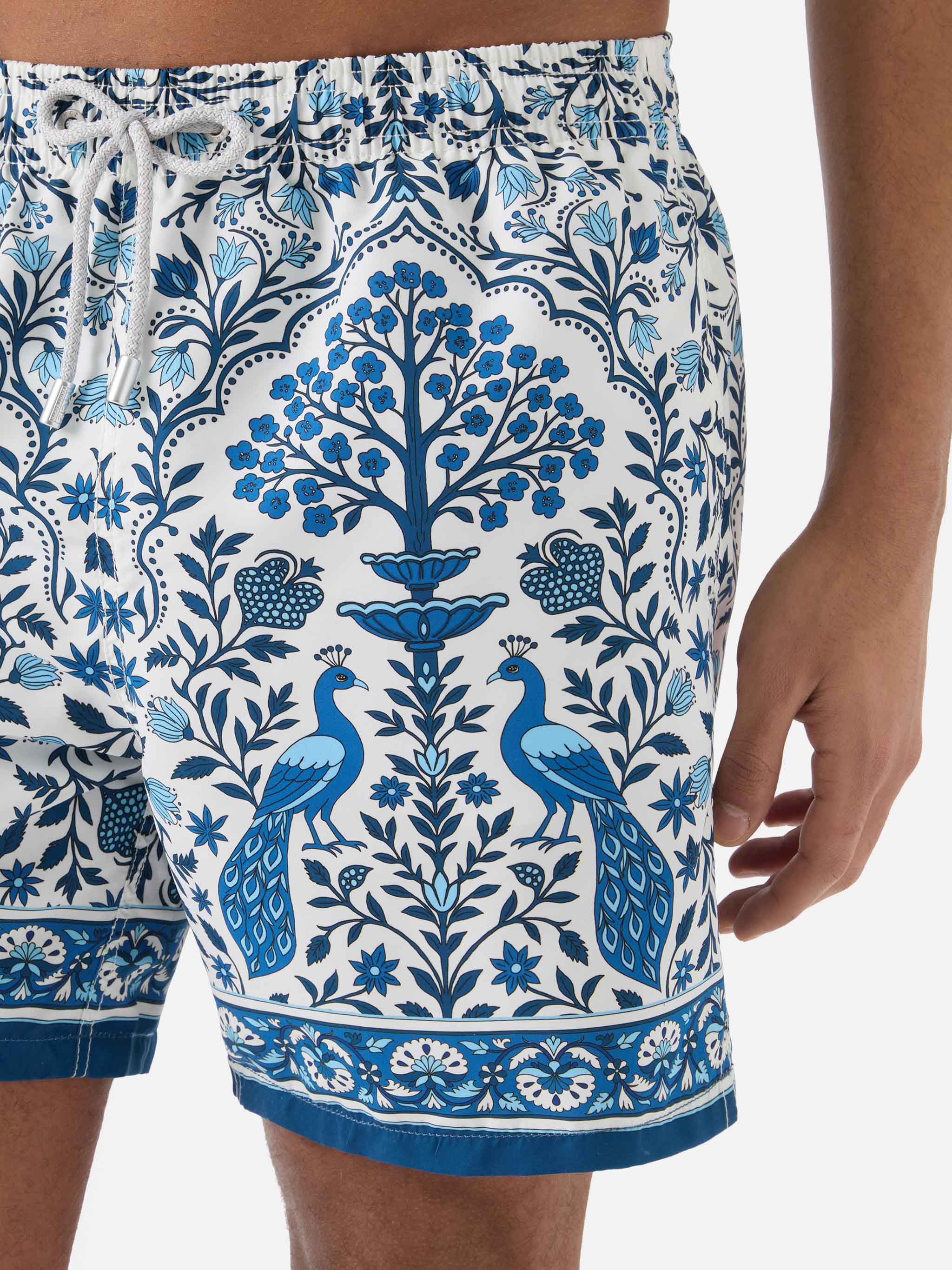 Gustavia White Swim Shorts With Contrasting Peacock Print Swimshort