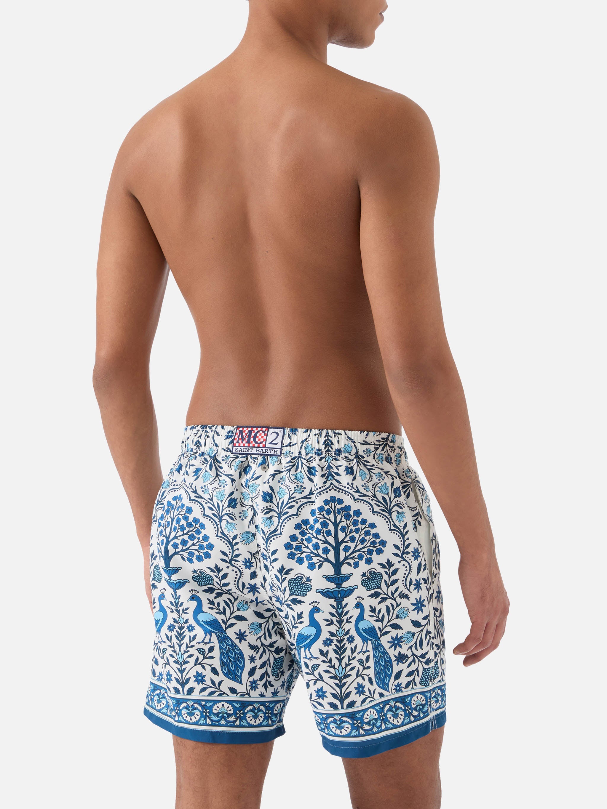 Gustavia White Swim Shorts With Contrasting Peacock Print Swimshort