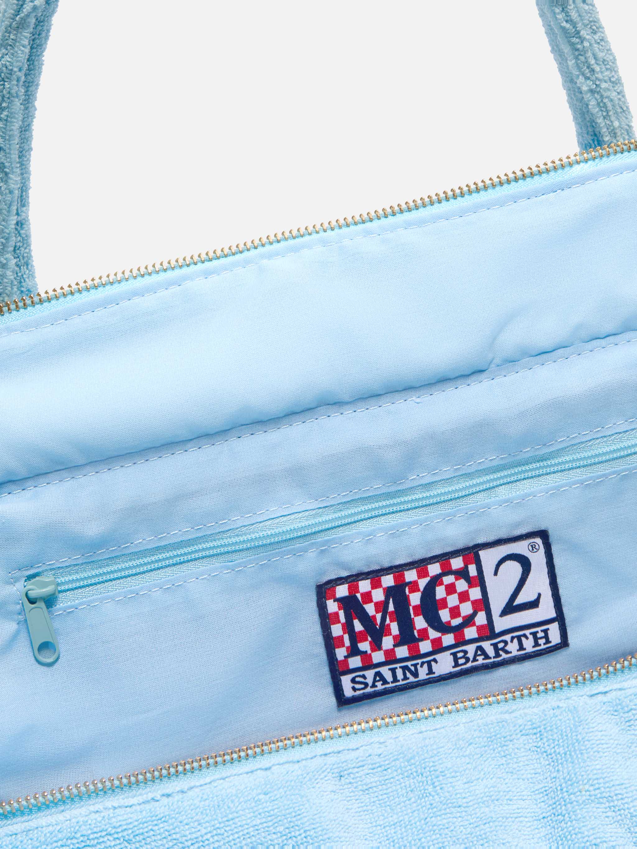 Light Blue Solid Terry Effect Vanity Regular Bag Sky