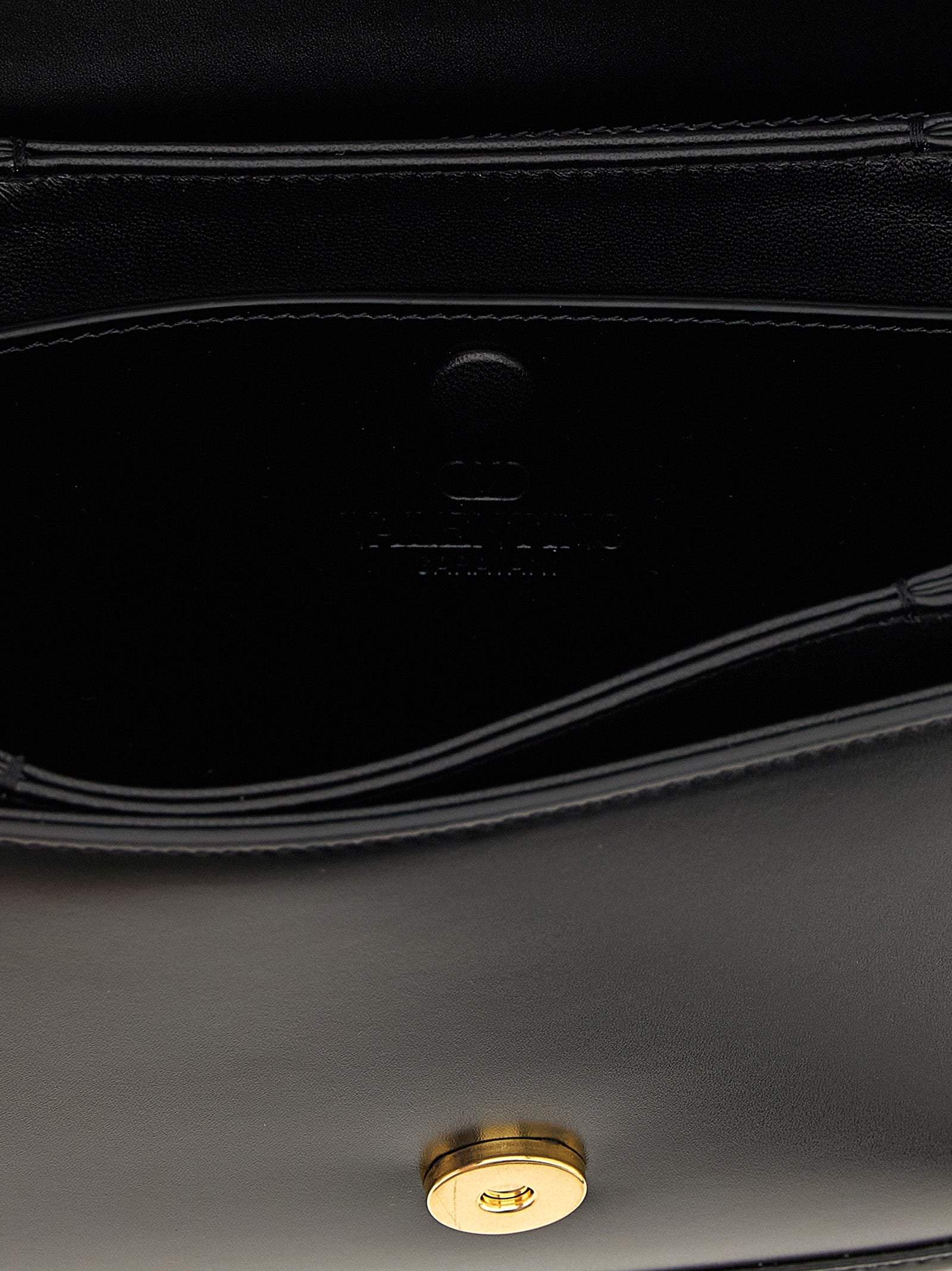 Valentino Garavani 9TO5 small shoulder bag Black Calfskin Leather (bos Taurus) Crossbody