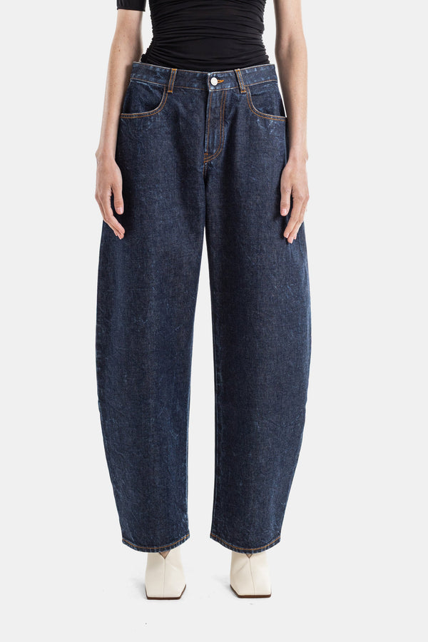 Maison AlaïA Raw denim jeans in blue