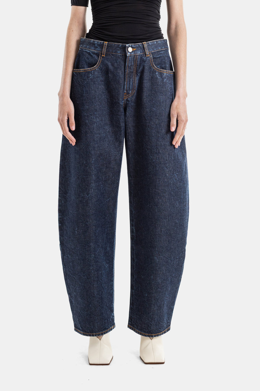 Maison AlaïA Raw denim jeans in blue