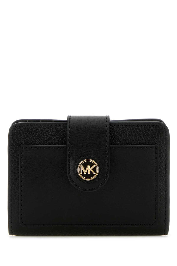 Michael By Michael Kors Charm Exterior: 100% Leather wallet in black