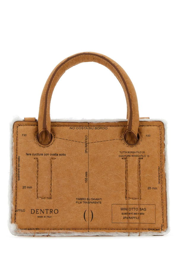 Dentro Tracolla Exterior: 100% Paper; Lining: 100% Leather; Finishing: Silver metal mini bag in brown