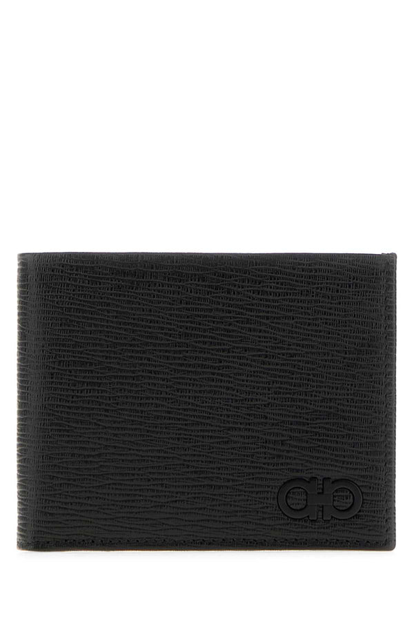 Ferragamo Ganc Exterior: 100% Leather; Finishing: Enameled metal wallet in black