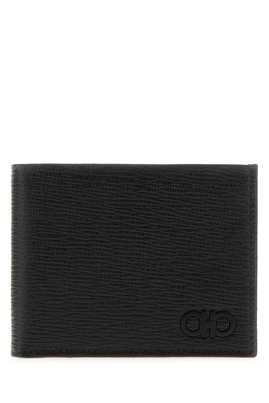 Ferragamo Ganc Exterior: 100% Leather. Finishing: Enameled metal wallet in black