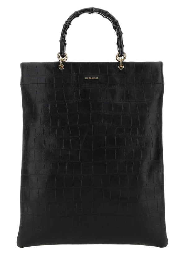 Jil Sander Exterior: 100% Leather Finishing: Golden metal top handle bag in black