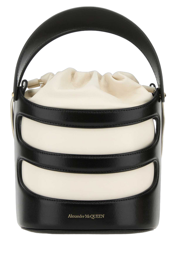 Alexander McQueen Exterior: 100% Leather; Lining: 100% Leather; Finishing: Golden metal bucket bag in black