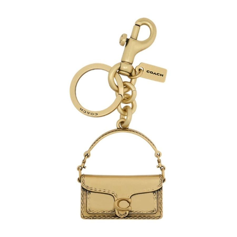 Coach resin key charm in beige