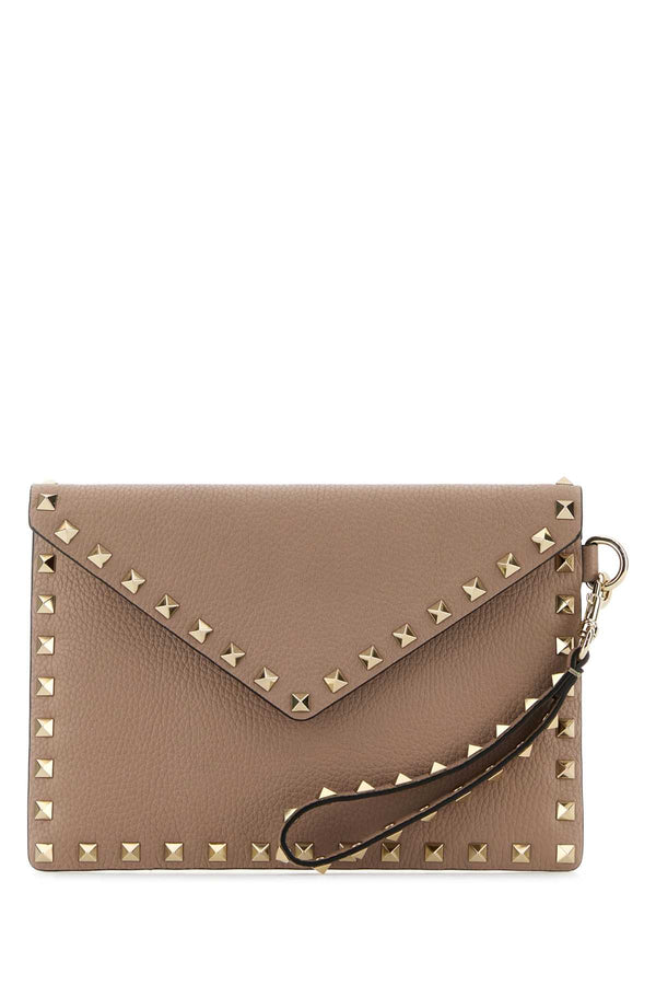 Valentino Garavani Flat Exterior: 100% Calf Lining: 100% Suede Finishing: Platinum clutch in pink