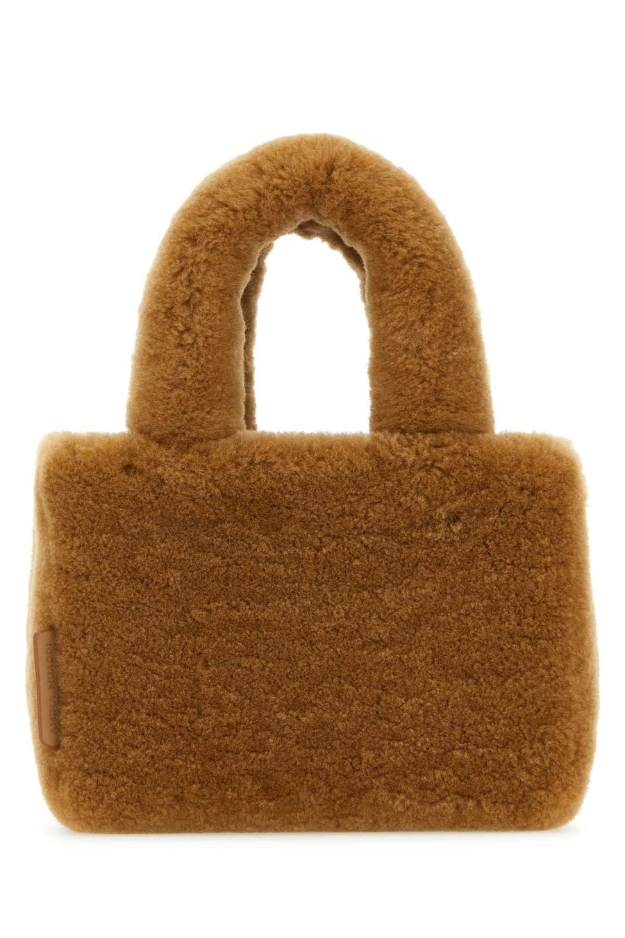 Amina Muaddi Mano Exterior: 100% Shearling top handle bag in camel