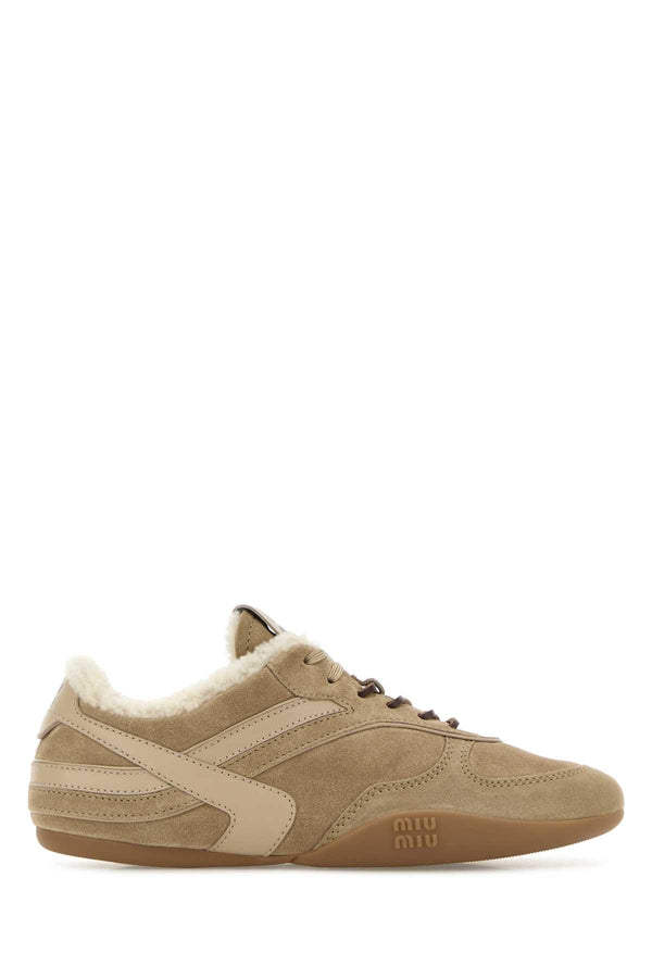 Miu Miu Exterior: 100% Suede. Interior: 100% Shearling. Sole: Rubber sneaker in beige
