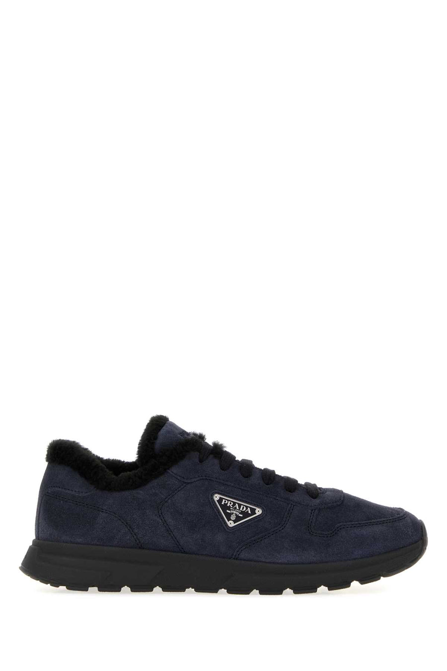 Prada Winter Exterior: 100% Leather; Interior: 100% Leather; Sole: Rubber sneaker in navy