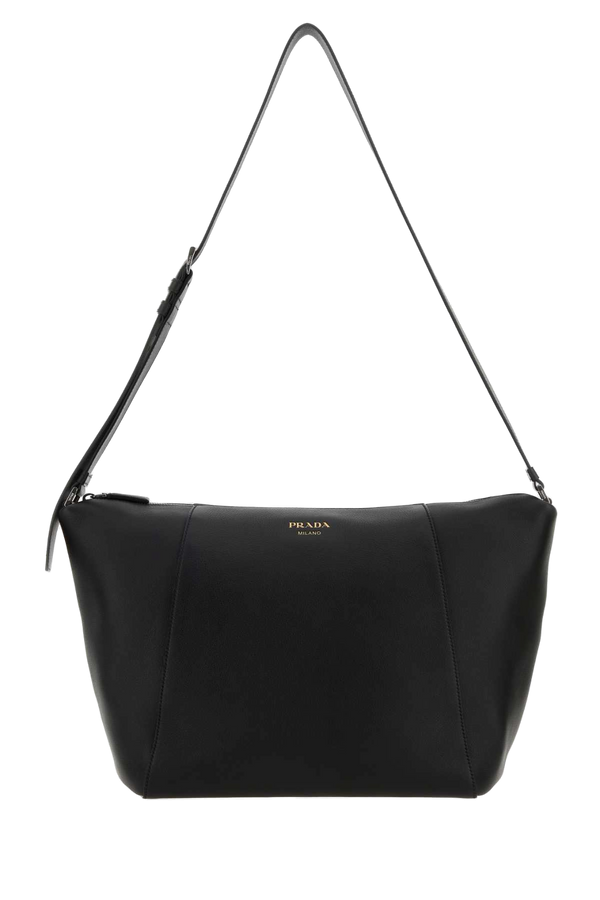 Prada Exterior: 100% Leather; Lining: 100% Fabric; Hardware: Silver metal crossbody bag in black