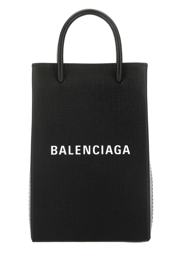 Balenciaga Exterior: 100% Calf. Lining: 100% Fabric. Finishing: Silver metal top handle bag in black
