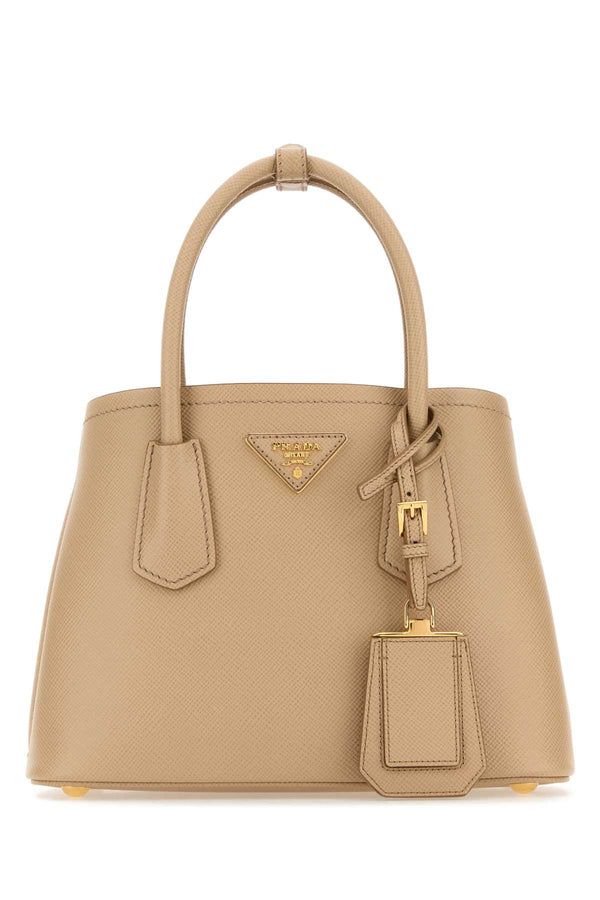 Prada 100% Vitello (calf leather) top handle bag in beige