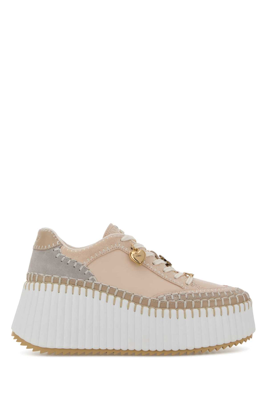 Chloé Exterior: 100% Bovine leather; Interior: 100% Fabric; Sole: Rubber sneaker in beige