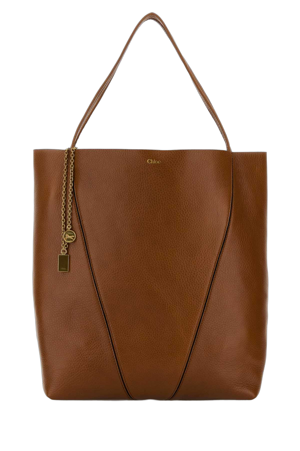 Chloé Exterior: 100% Calf Lining: 100% Leather Finishing: Antiqued golden metal shoulder bag in brown