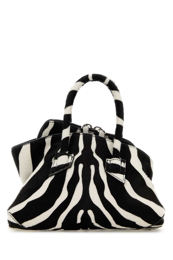 The Attico Exterior: 100% Leather; Lining: 100% Suede; Finishing: Silver metal top handle bag in black