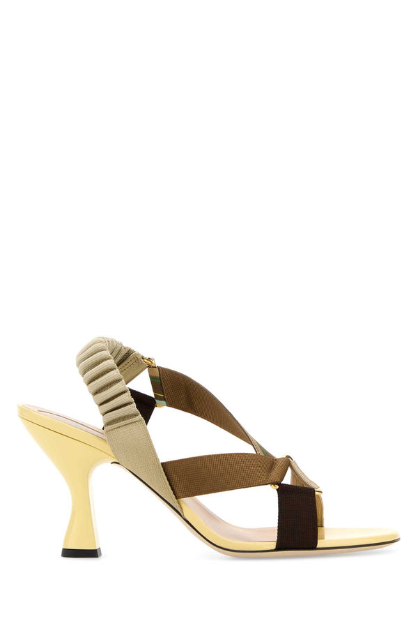 Fendi Exterior: 100% Fabric; Interior: 100% Leather; Sole: Leather and rubber sandal in yellow