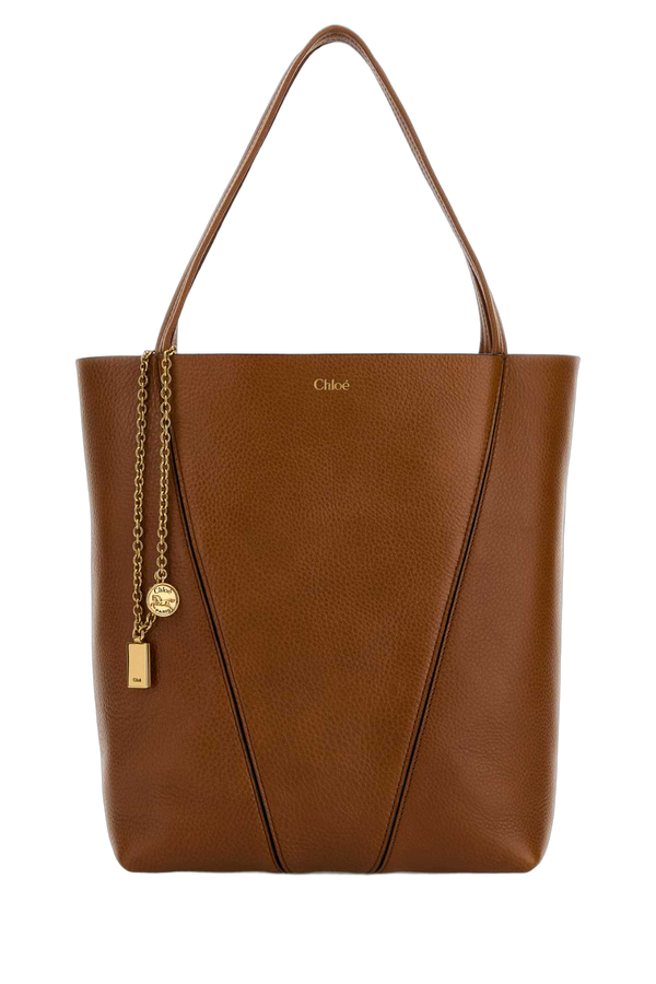 Chloé Exterior: 100% Calf Lining: 100% Leather Finishing: Antiqued golden metal tote bag in brown