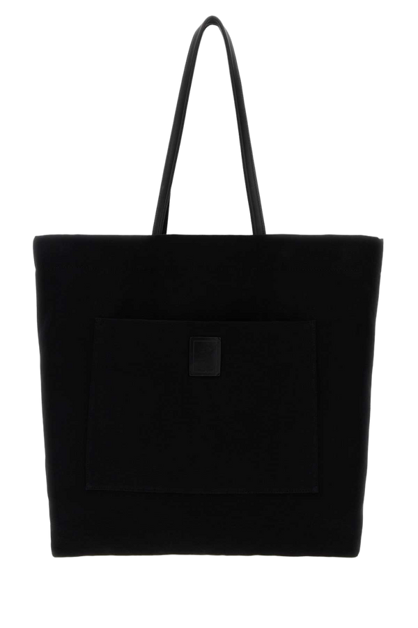 The Row Exterior: 100% Cotton tote bag in black