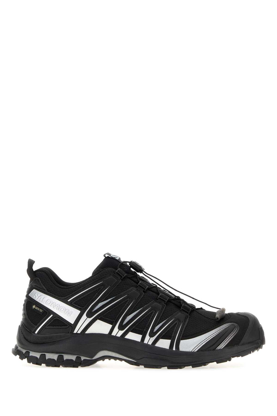 Salomon Exterior: 100% Fabric 100% Rubber; Interior: 100% Fabric; Sole: Rubber sneaker in black